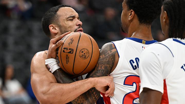 Oct 5, 2026; Detroit, Michigan, USA;  Phoenix Suns forward Dillon Brooks (3) and Detroit Pistons forward John Collins (20) have an exchange in the first quarter at Little Caesars Arena.  Mandatory Credit: Lon Horwedel-Imagn Images