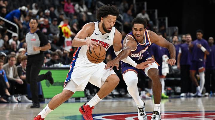 Oct 5, 2026; Detroit, Michigan, USA; Detroit Pistons guard Cade Cunningham (2) tries to keep the ball away from Phoenix Suns forward Oso Ighodaro (11) in the second quarter at Little Caesars Arena. Mandatory Credit: Lon Horwedel-Imagn Images Oct 5, 2026; Detroit, Michigan, USA; Detroit Pistons guard Cade Cunningham (2) tries to keep the ball away from Phoenix Suns forward Oso Ighodaro (11) in the second quarter at Little Caesars Arena. Mandatory Credit: Lon Horwedel-Imagn Images