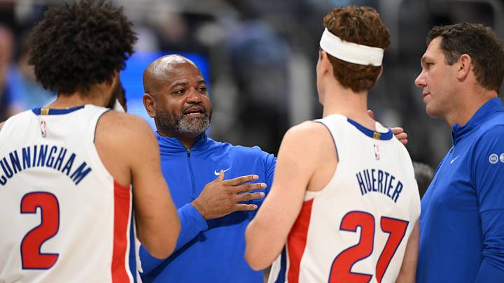 Oct 5, 2026; Detroit, Michigan, USA; Detroit Pistons head coach J.B. Bickerstaff talks with players Cade Cunningham (2) and Kevin Huerter (27) during a timeout against the Phoenix Suns in the first quarter at Little Caesars Arena. Mandatory Credit: Lon Horwedel-Imagn Images Oct 5, 2026; Detroit, Michigan, USA; Detroit Pistons head coach J.B. Bickerstaff talks with players Cade Cunningham (2) and Kevin Huerter (27) during a timeout against the Phoenix Suns in the first quarter at Little Caesars Arena. Mandatory Credit: Lon Horwedel-Imagn Images