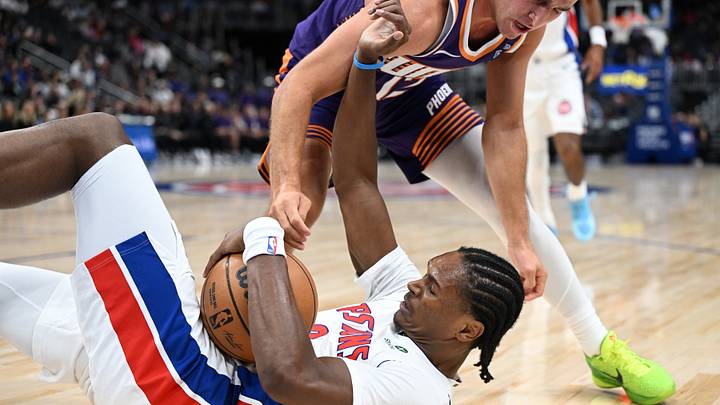 Oct 5, 2026; Detroit, Michigan, USA; Detroit Pistons guard Ausar Thompson (9) battle for a loose ball with Phoenix Suns guard Collin Gillespie (12) in the third quarter at Little Caesars Arena. Mandatory Credit: Lon Horwedel-Imagn Images Oct 5, 2026; Detroit, Michigan, USA; Detroit Pistons guard Ausar Thompson (9) battle for a loose ball with Phoenix Suns guard Collin Gillespie (12) in the third quarter at Little Caesars Arena. Mandatory Credit: Lon Horwedel-Imagn Images