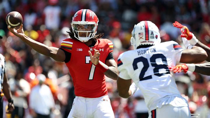 Aug 30, 2025; College Park, Maryland, USA; Maryland Terrapins quarterback Malik Washington (7) throws the ball past Florida Atlantic Owls linebacker Zyere Horton (28)during the second half at SECU Stadium. Mandatory Credit: Daniel Kucin Jr.-Imagn Images Aug 30, 2025; College Park, Maryland, USA; Maryland Terrapins quarterback Malik Washington (7) throws the ball past Florida Atlantic Owls linebacker Zyere Horton (28)during the second half at SECU Stadium. Mandatory Credit: Daniel Kucin Jr.-Imagn Images