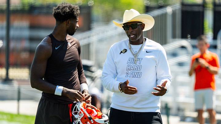 Deion Sanders spends time with his son, Cleveland Browns quarterback Shedeur Sanders (2) at the conclusion of the second day of training camp, July 30, 2026, in Berea, Ohio. Deion Sanders spends time with his son, Cleveland Browns quarterback Shedeur Sanders (2) at the conclusion of the second day of training camp, July 30, 2026, in Berea, Ohio.