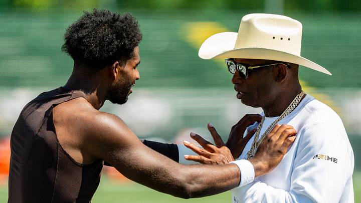 Deion Sanders spends time with his son, Cleveland Browns quarterback Shedeur Sanders (2) at the conclusion of the second day of training camp, July 30, 2026, in Berea, Ohio. Deion Sanders spends time with his son, Cleveland Browns quarterback Shedeur Sanders (2) at the conclusion of the second day of training camp, July 30, 2026, in Berea, Ohio.