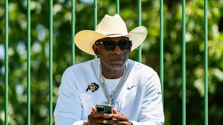 Deion Sanders takes in the second day of Cleveland Browns training camp, July 30, 2026, in Berea, Ohio. Deion Sanders takes in the second day of Cleveland Browns training camp, July 30, 2026, in Berea, Ohio.