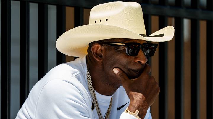 Deion Sanders takes in the second day of Cleveland Browns training camp, July 30, 2026, in Berea, Ohio. Deion Sanders takes in the second day of Cleveland Browns training camp, July 30, 2026, in Berea, Ohio.