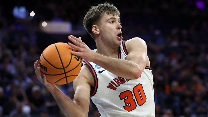 Mar 22, 2026; Philadelphia, PA, USA;Virginia Cavaliers guard Dallin Hall (30) rebounds the ball against the Tennessee Volunteers  in the second half during a second round game of the men's 2026 NCAA Tournament at Xfinity Mobile Arena. Mandatory Credit: Bill Streicher-Imagn Images