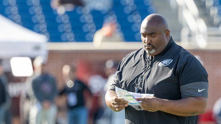Jan 29, 2026; Mobile, AL, USA; National Team head coach Clint Hurtt of the Philadelphia Eagles checks his notes during National Senior Bowl practice at Hancock Whitney Stadium. Jan 29, 2026; Mobile, AL, USA; National Team head coach Clint Hurtt of the Philadelphia Eagles checks his notes during National Senior Bowl practice at Hancock Whitney Stadium.