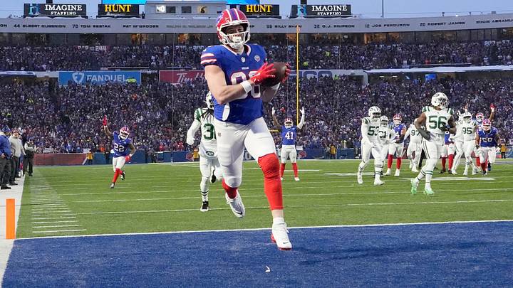 Bills tight end Dalton Kincaid races into the end zone to score the opening touchdown of the game in first quarter against the Jets during the first half of their last regular season game at Highmark Stadium in Orchard Park Sunday, Jan. 4, 2026. The Bills won 35-8. Bills tight end Dalton Kincaid races into the end zone to score the opening touchdown of the game in first quarter against the Jets during the first half of their last regular season game at Highmark Stadium in Orchard Park Sunday, Jan. 4, 2026. The Bills won 35-8.