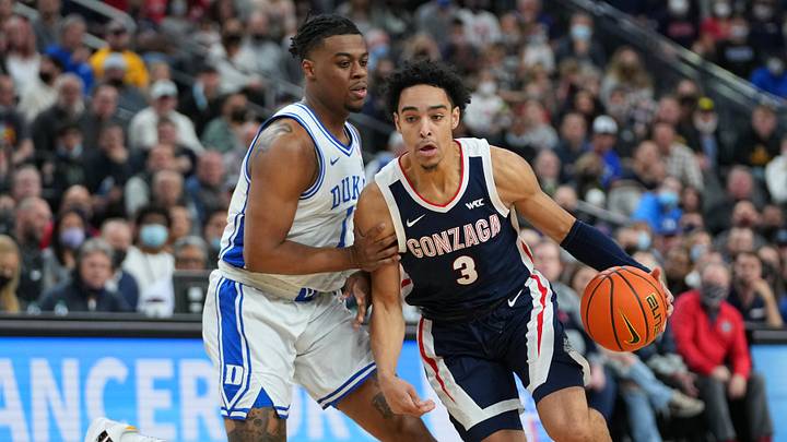 Nov 26, 2021; Las Vegas, Nevada, USA; Gonzaga Bulldogs guard Andrew Nembhard (3) dribbles against Duke Blue Devils guard Trevor Keels (1) during the first half at T-Mobile Arena. Nov 26, 2021; Las Vegas, Nevada, USA; Gonzaga Bulldogs guard Andrew Nembhard (3) dribbles against Duke Blue Devils guard Trevor Keels (1) during the first half at T-Mobile Arena.