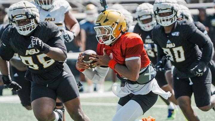 Alabama State quarterback Andrew Body (1) carries the ball during a scrimmage game at ASU in Montgomery, Ala., on Saturday August 8, 2026. Alabama State quarterback Andrew Body (1) carries the ball during a scrimmage game at ASU in Montgomery, Ala., on Saturday August 8, 2026.