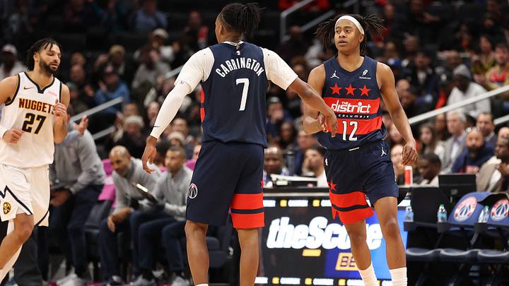 Jan 22, 2026; Washington, District of Columbia, USA; Washington Wizards guard Tre Johnson (12) celebrates with guard Bub Carrington (7) during the second half against the Denver Nuggets at Capital One Arena. Mandatory Credit: Daniel Kucin Jr.-Imagn Images Jan 22, 2026; Washington, District of Columbia, USA; Washington Wizards guard Tre Johnson (12) celebrates with guard Bub Carrington (7) during the second half against the Denver Nuggets at Capital One Arena. Mandatory Credit: Daniel Kucin Jr.-Imagn Images