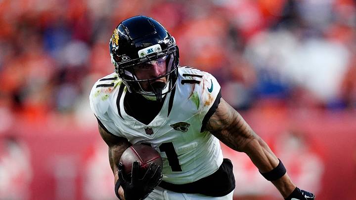 Dec 21, 2025; Denver, Colorado, USA; Jacksonville Jaguars wide receiver Parker Washington (11) makes a catch against the Denver Broncos during the second at Empower Field at Mile High. Mandatory Credit: Ron Chenoy-Imagn Images Dec 21, 2025; Denver, Colorado, USA; Jacksonville Jaguars wide receiver Parker Washington (11) makes a catch against the Denver Broncos during the second at Empower Field at Mile High. Mandatory Credit: Ron Chenoy-Imagn Images