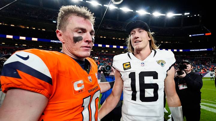 Dec 21, 2025; Denver, Colorado, USA; Denver Broncos quarterback Bo Nix (10) and Jacksonville Jaguars quarterback Trevor Lawrence (16) meet after the game at Empower Field at Mile High. Mandatory Credit: Ron Chenoy-Imagn Images Dec 21, 2025; Denver, Colorado, USA; Denver Broncos quarterback Bo Nix (10) and Jacksonville Jaguars quarterback Trevor Lawrence (16) meet after the game at Empower Field at Mile High. Mandatory Credit: Ron Chenoy-Imagn Images