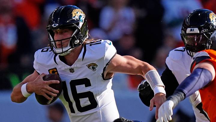 Dec 21, 2025; Denver, Colorado, USA; Jacksonville Jaguars quarterback Trevor Lawrence (16) rushes the ball against the Denver Broncos during the first half at Empower Field at Mile High. Mandatory Credit: Ron Chenoy-Imagn Images Dec 21, 2025; Denver, Colorado, USA; Jacksonville Jaguars quarterback Trevor Lawrence (16) rushes the ball against the Denver Broncos during the first half at Empower Field at Mile High. Mandatory Credit: Ron Chenoy-Imagn Images