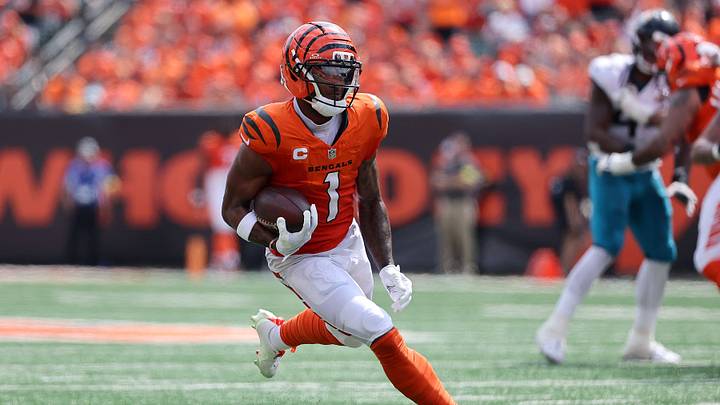 Sep 14, 2025; Cincinnati, Ohio, USA; Cincinnati Bengals wide receiver Ja'Marr Chase (1) runs with the ball during the second quarter against the Jacksonville Jaguars at Paycor Stadium. Mandatory Credit: Joseph Maiorana-Imagn Images Sep 14, 2025; Cincinnati, Ohio, USA; Cincinnati Bengals wide receiver Ja'Marr Chase (1) runs with the ball during the second quarter against the Jacksonville Jaguars at Paycor Stadium. Mandatory Credit: Joseph Maiorana-Imagn Images