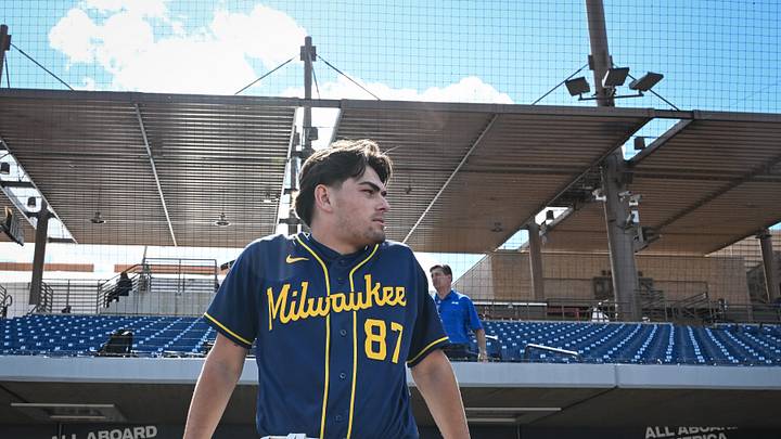 Milwaukee Brewers infield prospect Brady Ebel leans along the dugout rail during spring training workouts Tuesday, February 17, 2026, at American Family Fields of Phoenix in Phoenix, Arizona. Milwaukee Brewers infield prospect Brady Ebel leans along the dugout rail during spring training workouts Tuesday, February 17, 2026, at American Family Fields of Phoenix in Phoenix, Arizona.