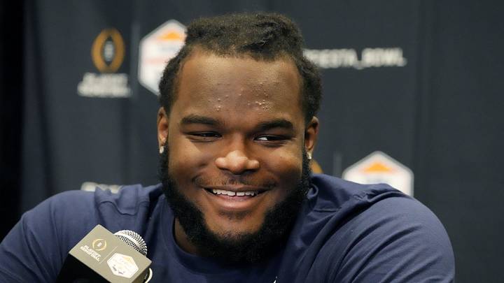 Michigan Wolverines defensive lineman Mazi Smith (58) speaks before the Fiesta Bowl in 2022. Michigan Wolverines defensive lineman Mazi Smith (58) speaks before the Fiesta Bowl in 2022.