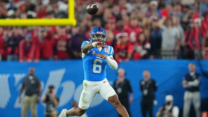 Jan 8, 2026; Glendale, AZ, USA; Mississippi Rebels quarterback Trinidad Chambliss (6) throws a pass agains the Miami Hurricanes in the second half during the 2026 Fiesta Bowl and semifinal game of the College Football Playoff at State Farm Stadium. Mandatory Credit: Joe Camporeale-Imagn Images Jan 8, 2026; Glendale, AZ, USA; Mississippi Rebels quarterback Trinidad Chambliss (6) throws a pass agains the Miami Hurricanes in the second half during the 2026 Fiesta Bowl and semifinal game of the College Football Playoff at State Farm Stadium. Mandatory Credit: Joe Camporeale-Imagn Images