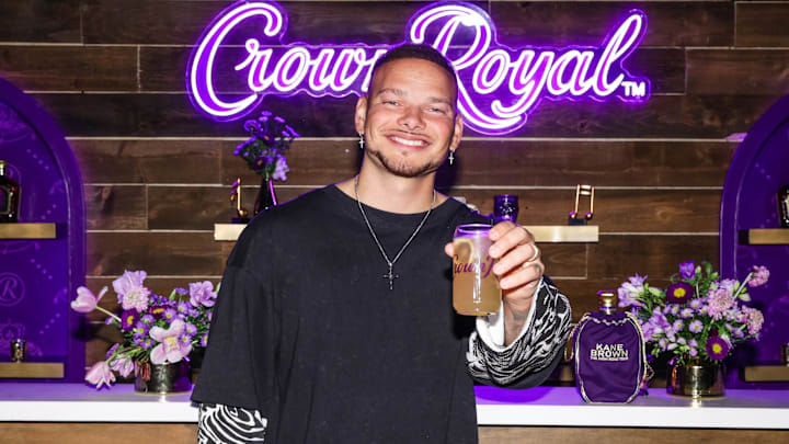 Kane Brown with one of his Signature Deluxe Cocktails, Crown Royal's Royal Ranch Water at the backstage VIP event prior to his concert at Bridgestone Arena in Nashville, Tennessee on April 12, 2025. Kane Brown with one of his Signature Deluxe Cocktails, Crown Royal's Royal Ranch Water at the backstage VIP event prior to his concert at Bridgestone Arena in Nashville, Tennessee on April 12, 2025.