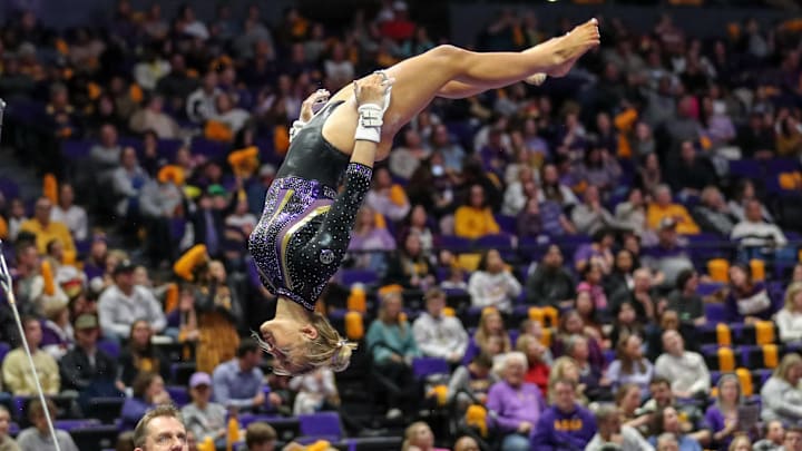 Livvy Dunne warms up on the uneven bars ahead of a meet against the Florida Gators at the PMAC. 