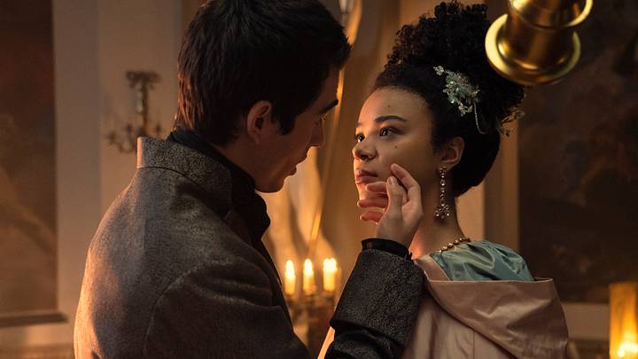 Corey Mylchreest as Young King George, India Amarteifio as Young Queen Charlotte in episode 102 of Queen Charlotte