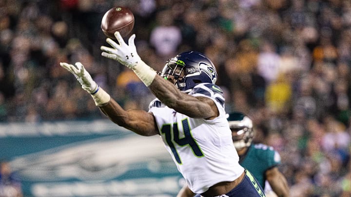 Jan 5, 2020; Philadelphia, Pennsylvania, USA; Seattle Seahawks wide receiver D.K. Metcalf (14) makes a touchdown catch against the Philadelphia Eagles during the third quarter in a NFC Wild Card playoff football game at Lincoln Financial Field. Mandatory Credit: Bill Streicher-Imagn Images