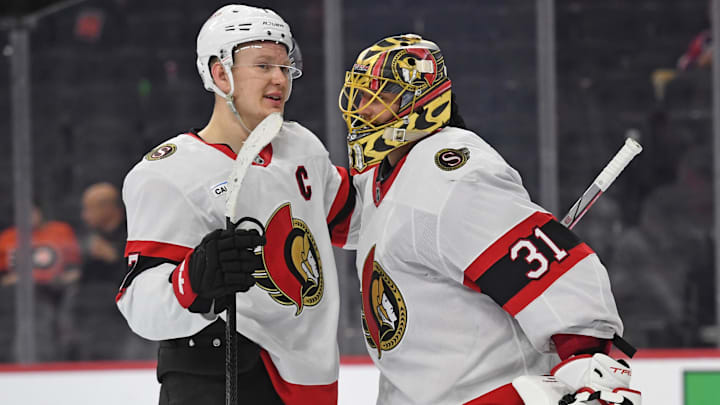 Mar 11, 2025; Philadelphia, Pennsylvania, USA; Ottawa Senators left wing Brady Tkachuk (7) and goaltender Anton Forsberg (31) celebrate win against the Philadelphia Flyers at Wells Fargo Center. Mandatory Credit: Eric Hartline-Imagn Images