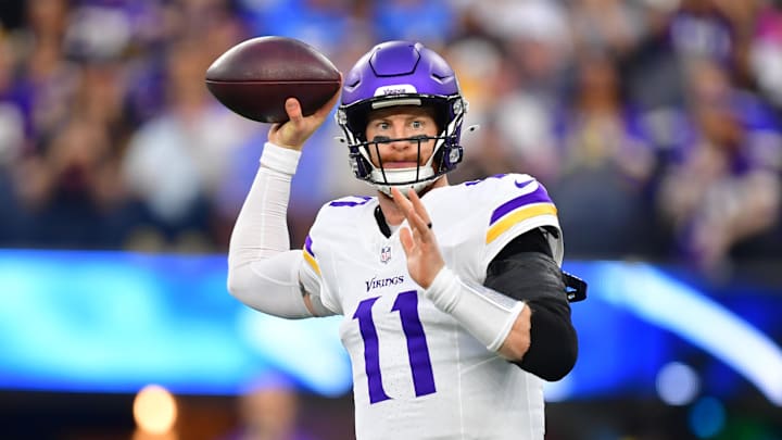 Oct 23, 2025; Inglewood, California, USA; Minnesota Vikings quarterback Carson Wentz (11) drops back to pass against the Los Angeles Chargers during the first half at SoFi Stadium. Mandatory Credit: Gary A. Vasquez-Imagn Images