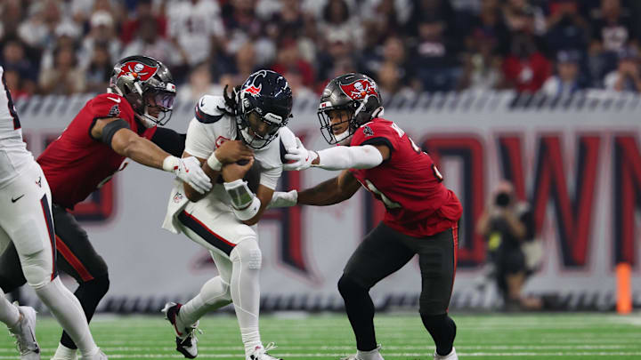 Sep 15, 2025; Houston, Texas, USA; Houston Texans quarterback C.J. Stroud (7) rushes for a first down during the second quarter against the Tampa Bay Buccaneers at NRG Stadium. Mandatory Credit: Thomas Shea-Imagn Images Sep 15, 2025; Houston, Texas, USA; Houston Texans quarterback C.J. Stroud (7) rushes for a first down during the second quarter against the Tampa Bay Buccaneers at NRG Stadium. Mandatory Credit: Thomas Shea-Imagn Images