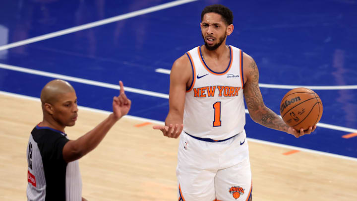 Mar 4, 2025; New York, New York, USA; New York Knicks guard Cameron Payne (1) reacts after being called for a foul by referee CJ Washington (12) during the fourth quarter against the Golden State Warriors at Madison Square Garden. Mandatory Credit: Brad Penner-Imagn Images