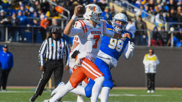 Mercer's quarterback Carter Peevy (7) throws the ball to a teammate on Saturday, Dec. 2, 2023 at Dana J Dykhouse Stadium in Brookings.