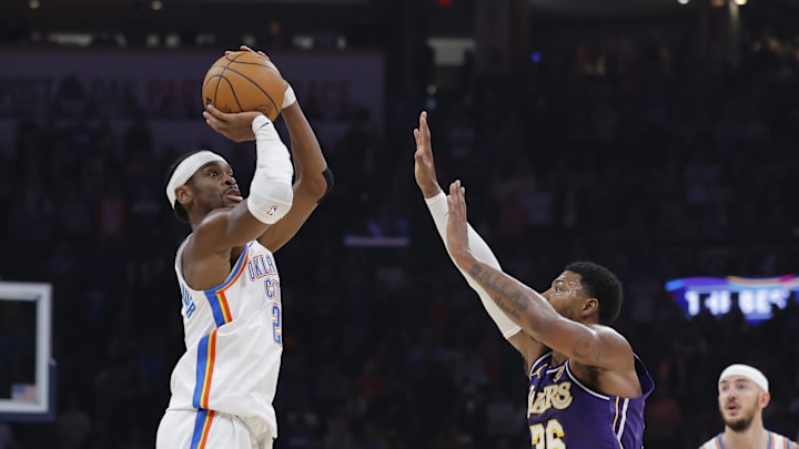 Nov 12, 2025; Oklahoma City, Oklahoma, USA; Oklahoma City Thunder guard Shai Gilgeous-Alexander (2) shoots over Los Angeles Lakers guard Marcus Smart (36) during the second quarter at Paycom Center. Mandatory Credit: Alonzo Adams-Imagn Images Nov 12, 2025; Oklahoma City, Oklahoma, USA; Oklahoma City Thunder guard Shai Gilgeous-Alexander (2) shoots over Los Angeles Lakers guard Marcus Smart (36) during the second quarter at Paycom Center. Mandatory Credit: Alonzo Adams-Imagn Images
