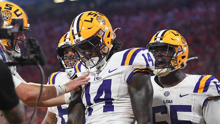 LSU Tigers tight end Trey'Dez Green celebrates with teammates after scoring a touchdown. LSU Tigers tight end Trey'Dez Green celebrates with teammates after scoring a touchdown.