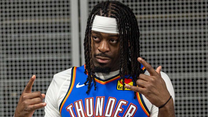 Nov 17, 2025; New Orleans, Louisiana, USA;  Oklahoma City Thunder guard Luguentz Dort (5) poses for a picture after the game against the New Orleans Pelicans at Smoothie King Center. Mandatory Credit: Stephen Lew-Imagn Images