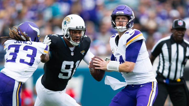 Nov 10, 2024; Jacksonville, Florida, USA; Minnesota Vikings quarterback Sam Darnold (14) gets ready to throw the ball against the Jacksonville Jaguars in the first quarter at EverBank Stadium. Nov 10, 2024; Jacksonville, Florida, USA; Minnesota Vikings quarterback Sam Darnold (14) gets ready to throw the ball against the Jacksonville Jaguars in the first quarter at EverBank Stadium.