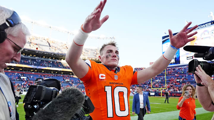 Denver Broncos quarterback Bo Nix celebrates after the win against the New York Giants at Empower Field at Mile High.
