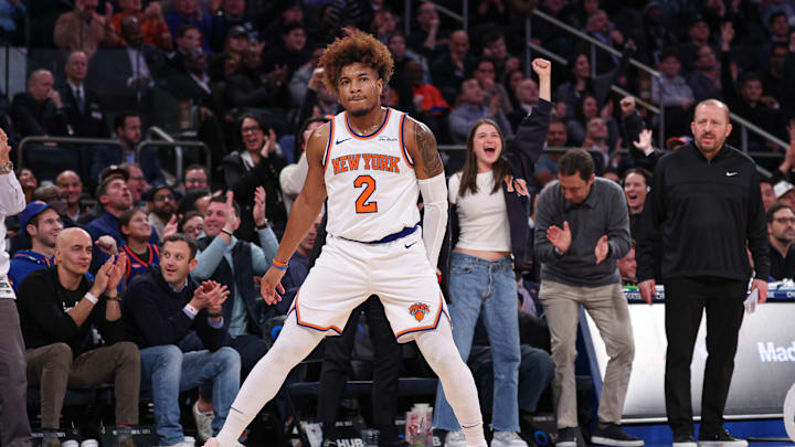 Feb 3, 2025; New York, New York, USA; New York Knicks guard Miles McBride (2) reacts after making a three point basket during the second half against the Houston Rockets at Madison Square Garden. Mandatory Credit: Vincent Carchietta-Imagn Images