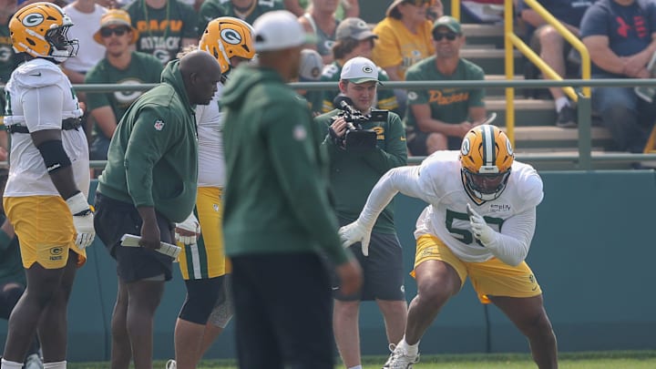 Green Bay Packers offensive tackle Zach Tom (50) runs through a drill during practice on Thursday, July 31, 2025, at Ray Nitschke Field in Ashwaubenon, Wis. 
Tork Mason/USA TODAY NETWORK-Wisconsin