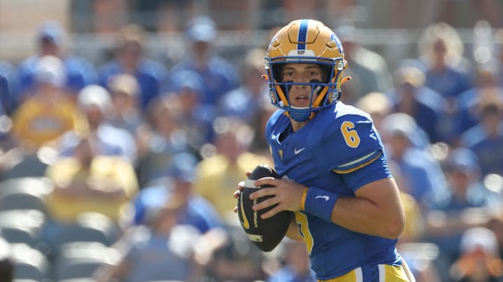 Oct 4, 2025; Pittsburgh, Pennsylvania, USA; Pittsburgh Panthers quarterback Mason Heintschel (6) looks to pass against the Boston College Eagles during the first quarter at Acrisure Stadium. Mandatory Credit: Charles LeClaire-Imagn Images