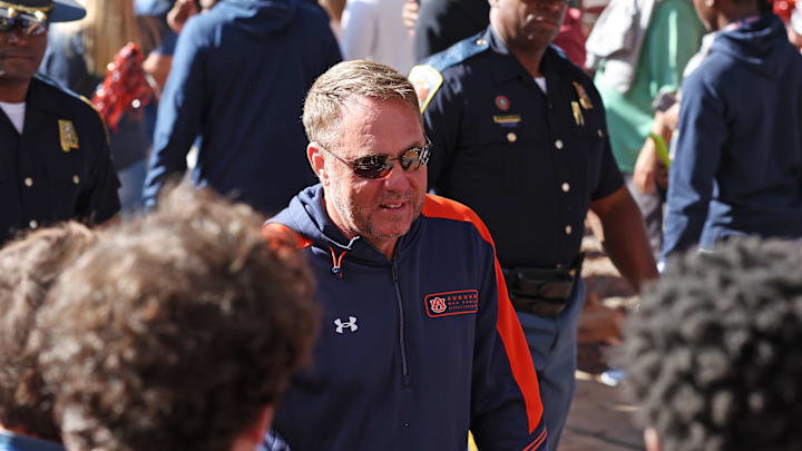 Nov 16, 2024; Auburn, Alabama, USA;  Auburn Tigers head coach Hugh Freeze greets fans during Tiger Walk before the game against the Louisiana Monroe Warhawks at Jordan-Hare Stadium. Mandatory Credit: John Reed-Imagn Images