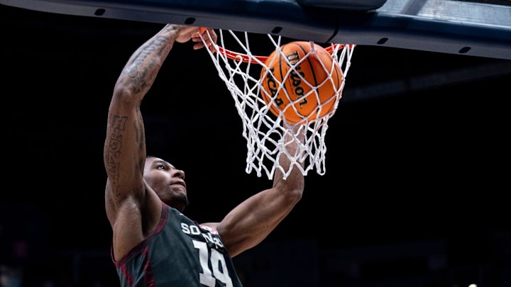 Oklahoma Sooners forward Jalon Moore (14) dunks after a steal against Oklahoma during the final seconds of their second round game of the SEC Men's Basketball Tournament at Bridgestone Arena in Nashville, Tenn., Thursday, March 13, 2025. Oklahoma Sooners forward Jalon Moore (14) dunks after a steal against Oklahoma during the final seconds of their second round game of the SEC Men's Basketball Tournament at Bridgestone Arena in Nashville, Tenn., Thursday, March 13, 2025.