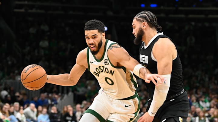 Boston Celtics forward Jayson Tatum (0) moves the ball against Memphis Grizzlies forward David Roddy (21) during the first half at TD Garden. Mandatory Credit: Eric Canha-Imagn Images Boston Celtics forward Jayson Tatum (0) moves the ball against Memphis Grizzlies forward David Roddy (21) during the first half at TD Garden. Mandatory Credit: Eric Canha-Imagn Images