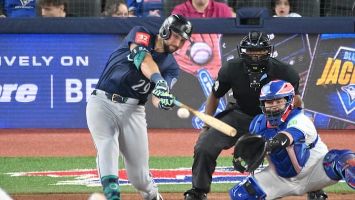 Seattle Mariners catcher Cal Raleigh (29) hits a double against the Toronto Blue Jays in the fifth inning at Rogers Centre on April 19.