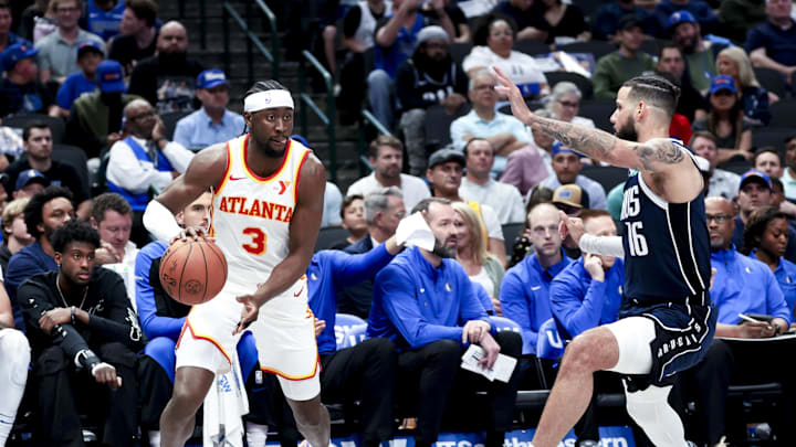Apr 2, 2025; Dallas, Texas, USA; Atlanta Hawks guard Caris LeVert (3) looks to shoot as Dallas Mavericks forward Caleb Martin (16) defends during the second half at American Airlines Center. Mandatory Credit: Kevin Jairaj-Imagn Images Apr 2, 2025; Dallas, Texas, USA; Atlanta Hawks guard Caris LeVert (3) looks to shoot as Dallas Mavericks forward Caleb Martin (16) defends during the second half at American Airlines Center. Mandatory Credit: Kevin Jairaj-Imagn Images