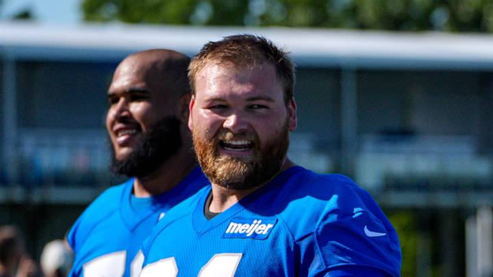 Detroit Lions center Cade Mays (64), left, talks to offensive tackle Penei Sewell (58) as they walk off the field after practice during training camp at Meijer Performance Center in Allen Park on Wednesday, July 29, 2026.
