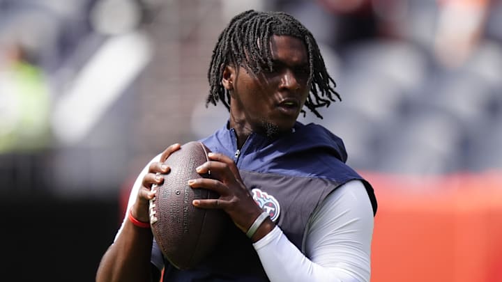 Tennessee Titans quarterback Cam Ward before the game at Empower Field at Mile High. Tennessee Titans quarterback Cam Ward before the game at Empower Field at Mile High.