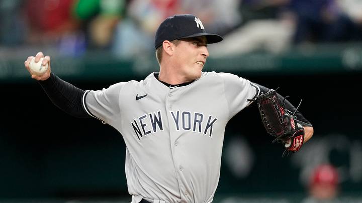 Apr 29, 2023; Arlington, Texas, USA; New York Yankees relief pitcher Ron Marinaccio (97) throws against the Texas Rangers during the sixth inning at Globe Life Field. Mandatory Credit: Jim Cowsert-USA TODAY Sports