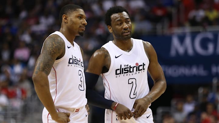 Apr 22, 2018; Washington, DC, USA; Washington Wizards guard Bradley Beal (3) talks with Washington Wizards guard John Wall (2) against the Toronto Raptors in the second quarter in game four of the first round of the 2018 NBA Playoffs at Capital One Arena. The Wizards won 106-98. Mandatory Credit: Geoff Burke-Imagn Images