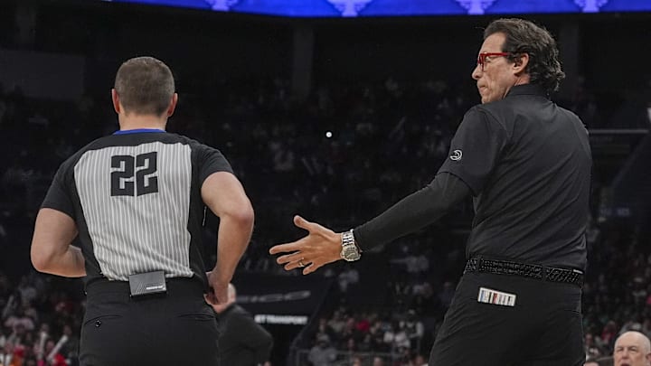 Feb 14, 2024; Charlotte, North Carolina, USA;  Atlanta Hawks head coach Quin Snyder reacts to a call