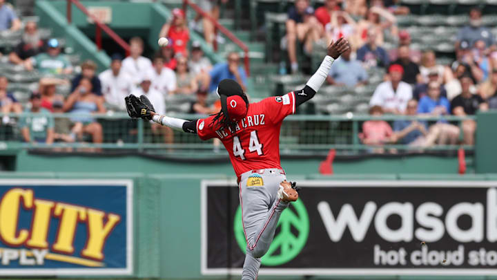 Jul 2, 2025; Boston, MA, USA; Cincinnati Reds shortstop Elly De La Cruz (44) attempts to catch a pop fly during the sixth inning against the Boston Red Sox at Fenway Park. Mandatory Credit: Paul Rutherford-Imagn Images